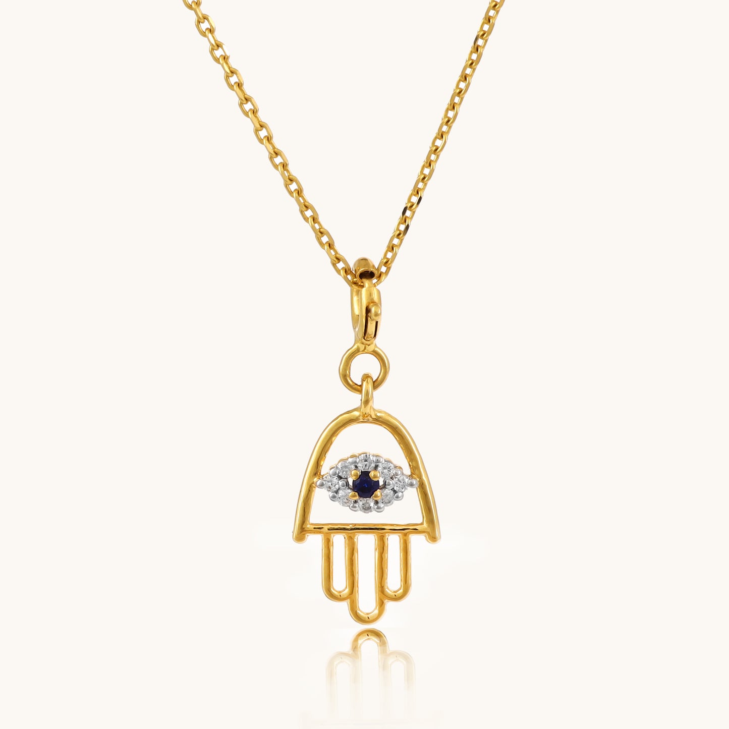 Explore sophistication with our Artful Evil Eye Pendant, a stunning addition to the Spring Edit collection, meticulously crafted in exquisite 18 kt gold. Priced under 30,000, this pendant is not only a stylish enhancement to your everyday jewellery ensemble but also an ideal gift for her.