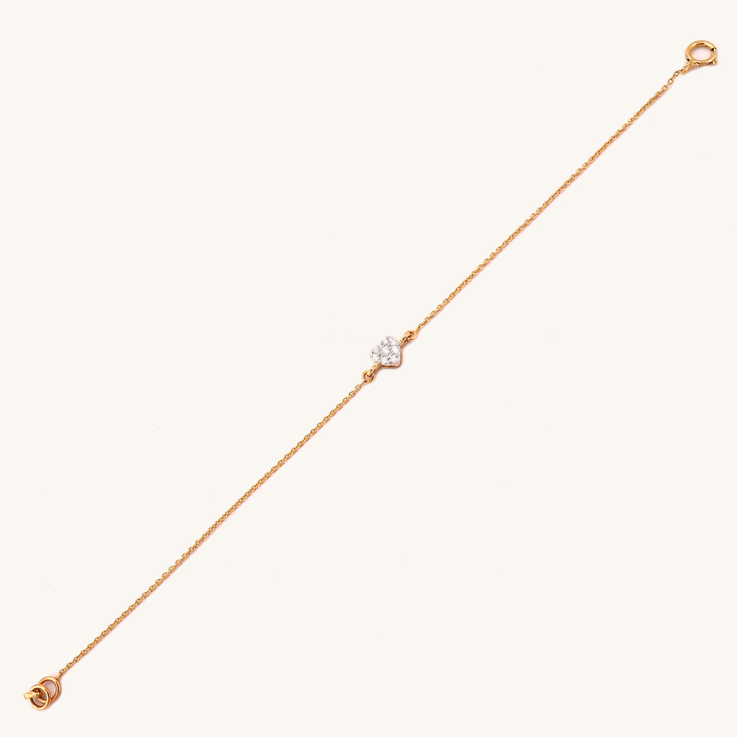 Elevate your everyday style with the 18kt Shining Heart Bracelet crafted with diamond. This delicate and feminine piece is perfect for everyday wear, work attire, and casual looks, making it an ideal gifting idea for her. Priced under Rs. 30,000, this elegant bracelet is a must-have addition to your accessory collection, effortlessly elevating any outfit.