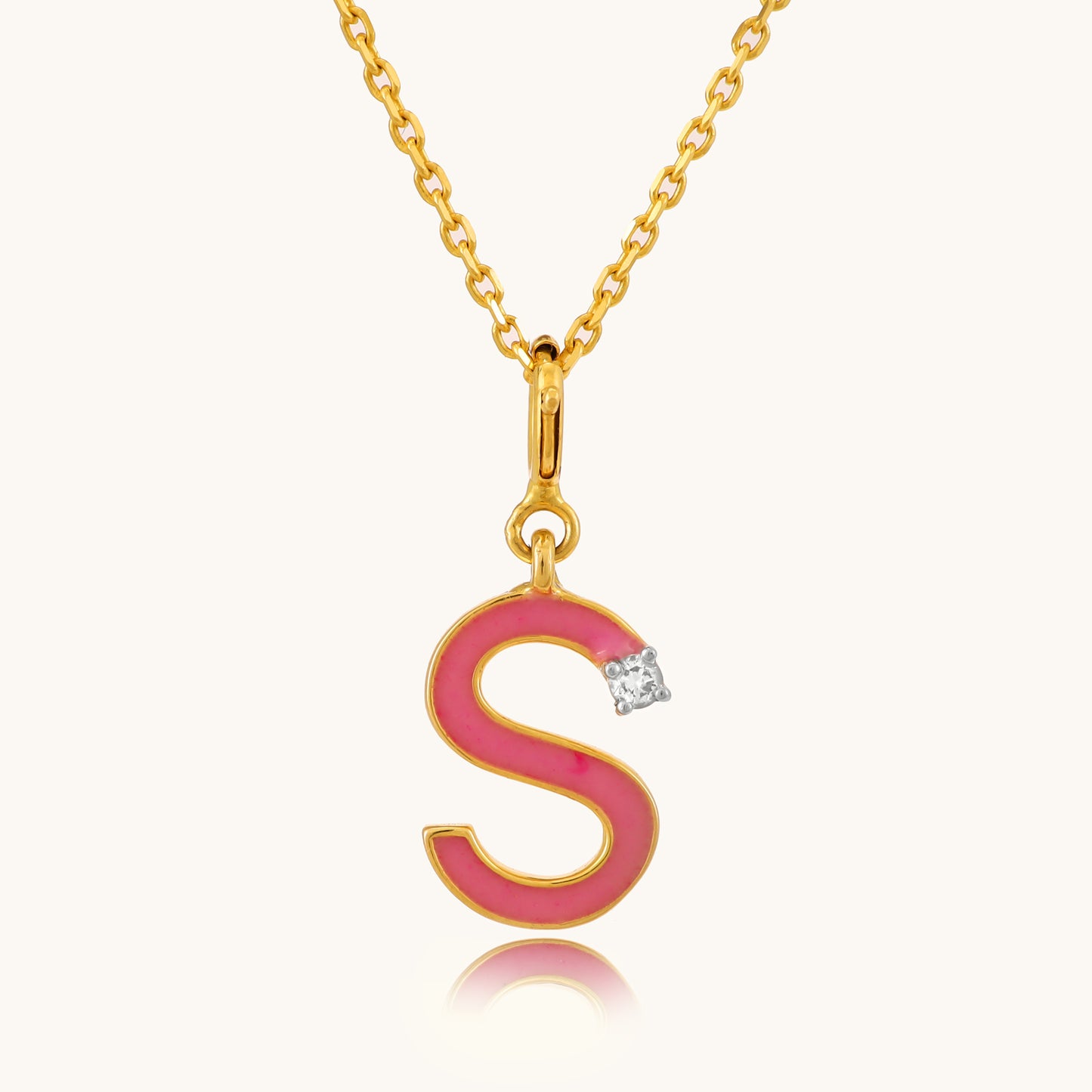 Elevate your style with our enchanting 18kt gold Pink Diamond Charm, celebrating the allure of the letter S. Whether it's adding a personal touch to your everyday ensemble, sparkling up your office attire, or enhancing your casual look, this charming piece is a versatile must-have. Perfect as a gift for her or a delightful treat for yourself, its timeless elegance is bound to captivate.
