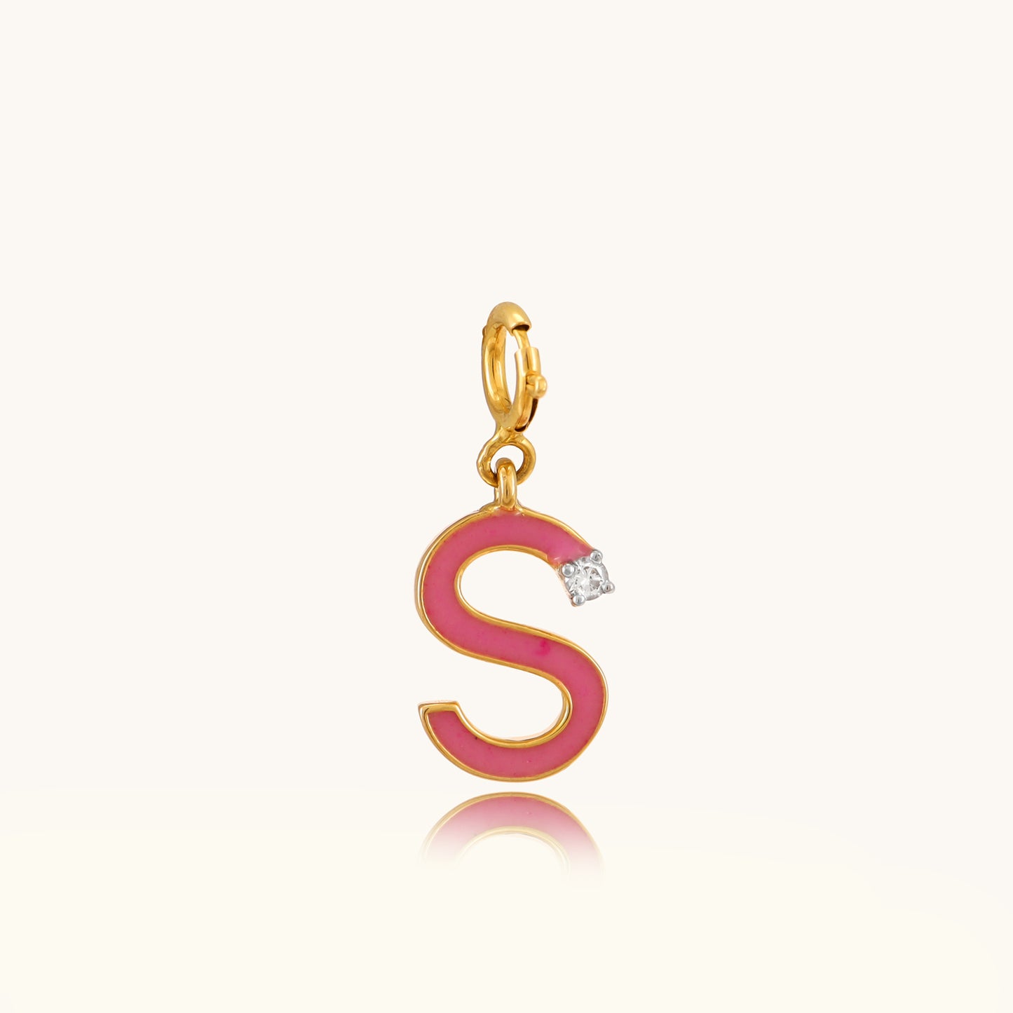 Elevate your style with our enchanting 18kt gold Pink Diamond Charm, celebrating the allure of the letter S. Whether it's adding a personal touch to your everyday ensemble, sparkling up your office attire, or enhancing your casual look, this charming piece is a versatile must-have. Perfect as a gift for her or a delightful treat for yourself, its timeless elegance is bound to captivate.