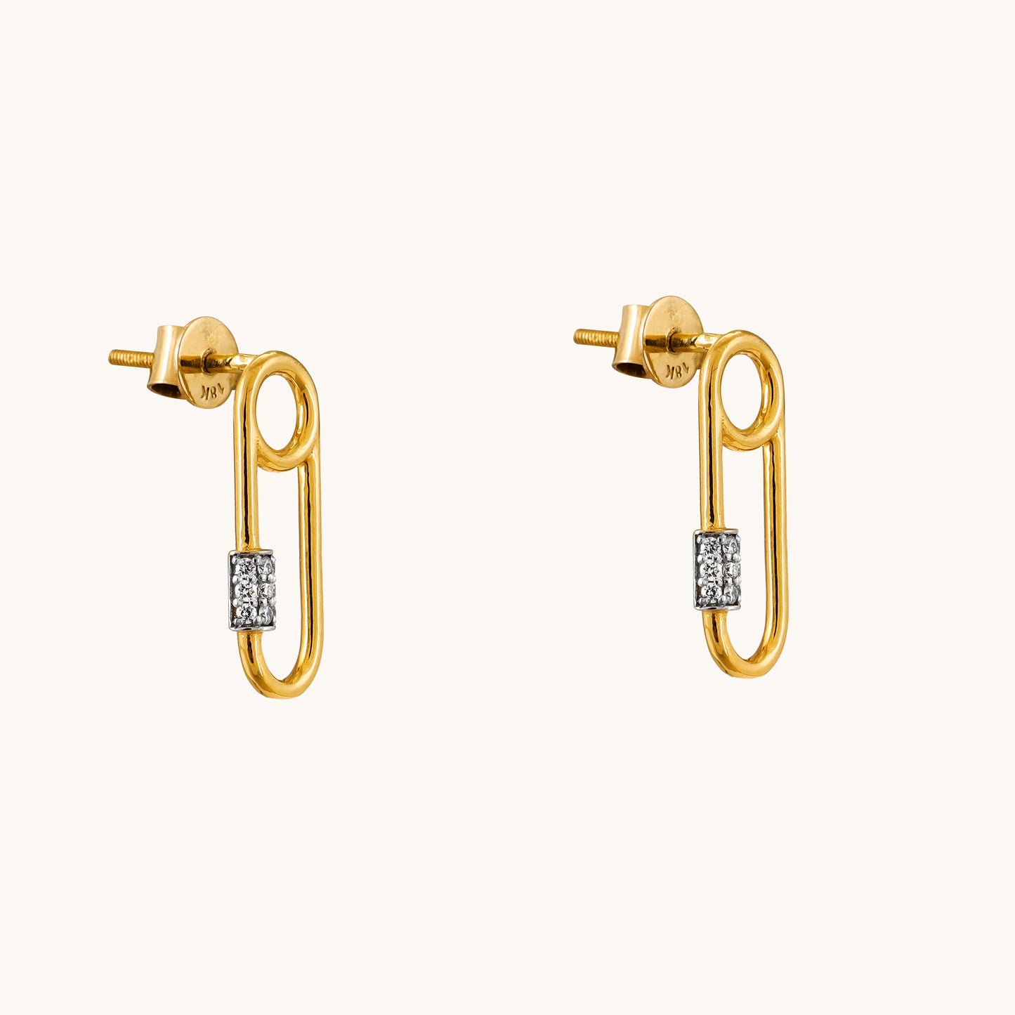 Enhance your style with our Spring Edit: the exquisite 18 kt Pin Diamond Earrings, priced under Rs. 30,000. These versatile jewelry pieces effortlessly transition from day to night, making them an ideal addition to any ensemble. Perfect for gifting to her, shop now for timeless elegance.