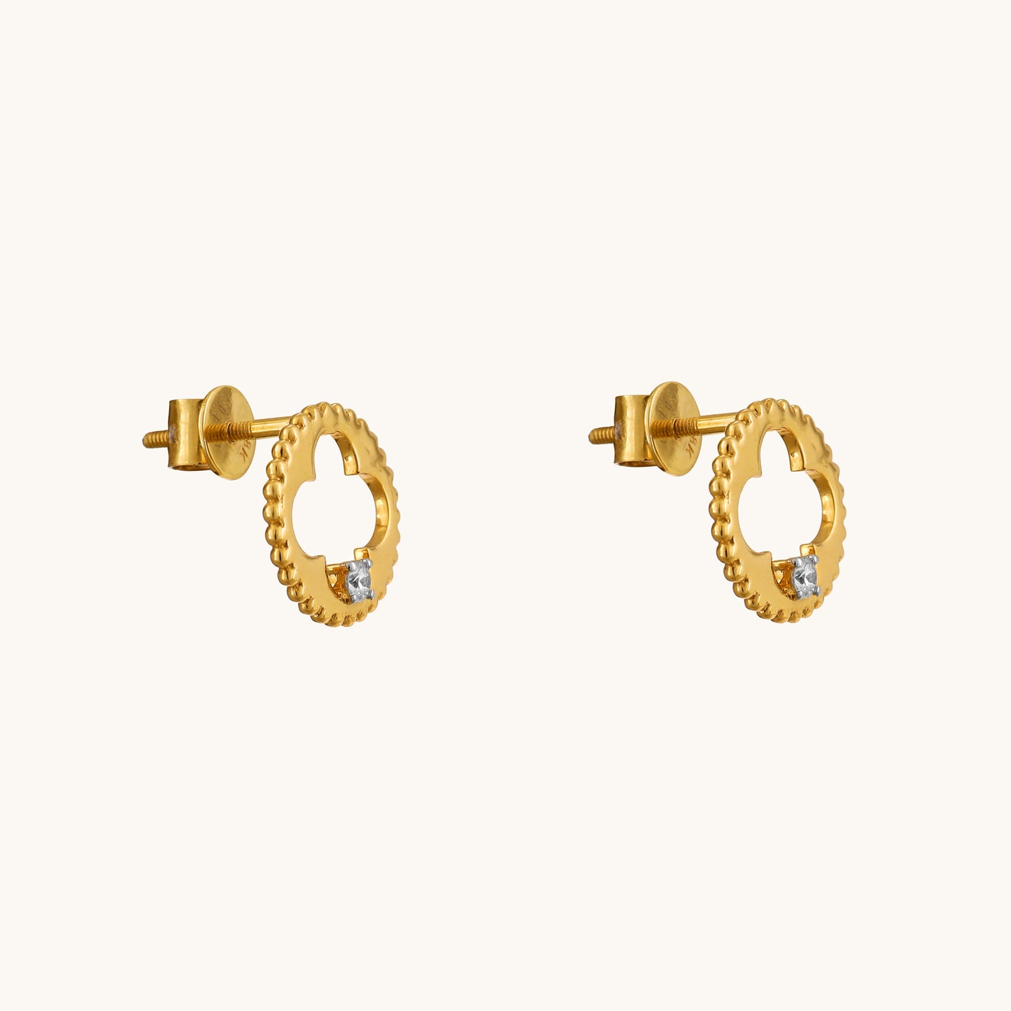 Bloom with style this spring with our exquisite 18 kt Flower Cutter Earrings. Priced under Rs. 30,000, these stunning jewelry pieces seamlessly transition from day to night, making them a perfect addition to any ensemble. Ideal for gifting to her, shop now to add a touch of floral elegance to her wardrobe.