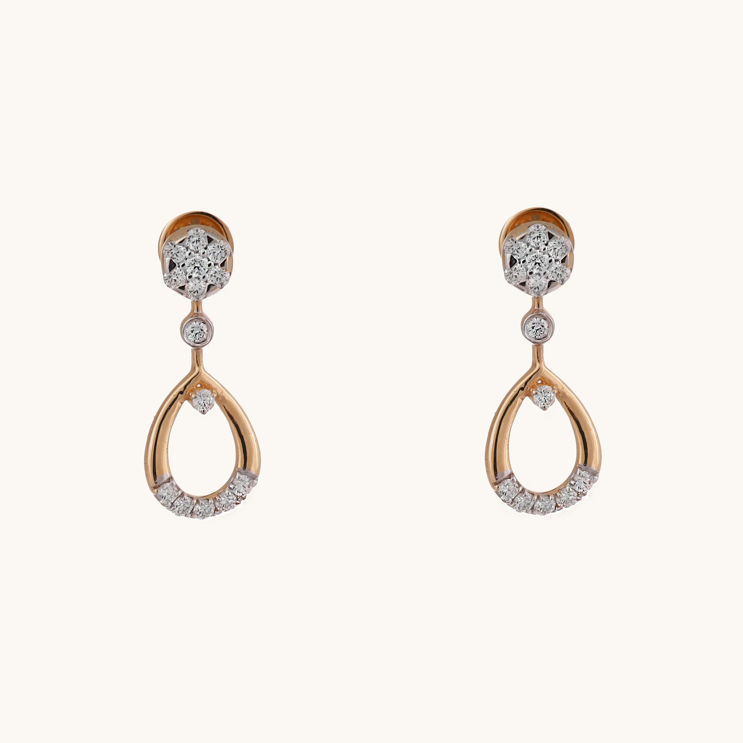 Elegant Orbit Diamond Earring in 18kt gold with IGI certified VVS diamonds, perfect for everyday wear and gifts under Rs. 35k.