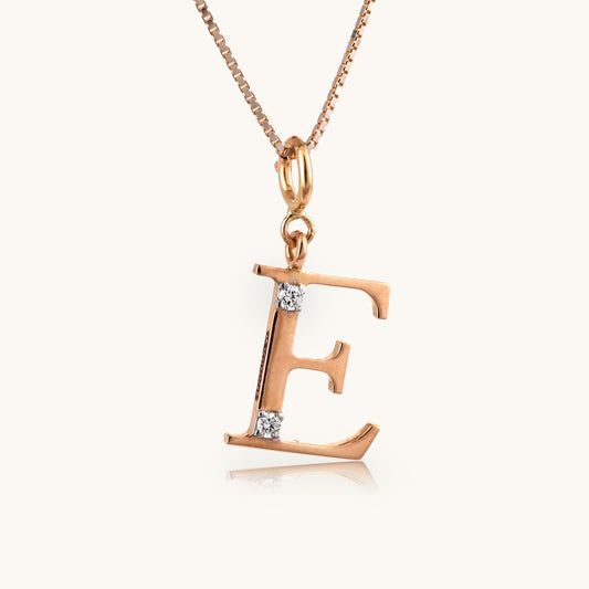 18kt gold "E" initial pendant with VVS diamonds—affordable luxury fine jewellery for women.