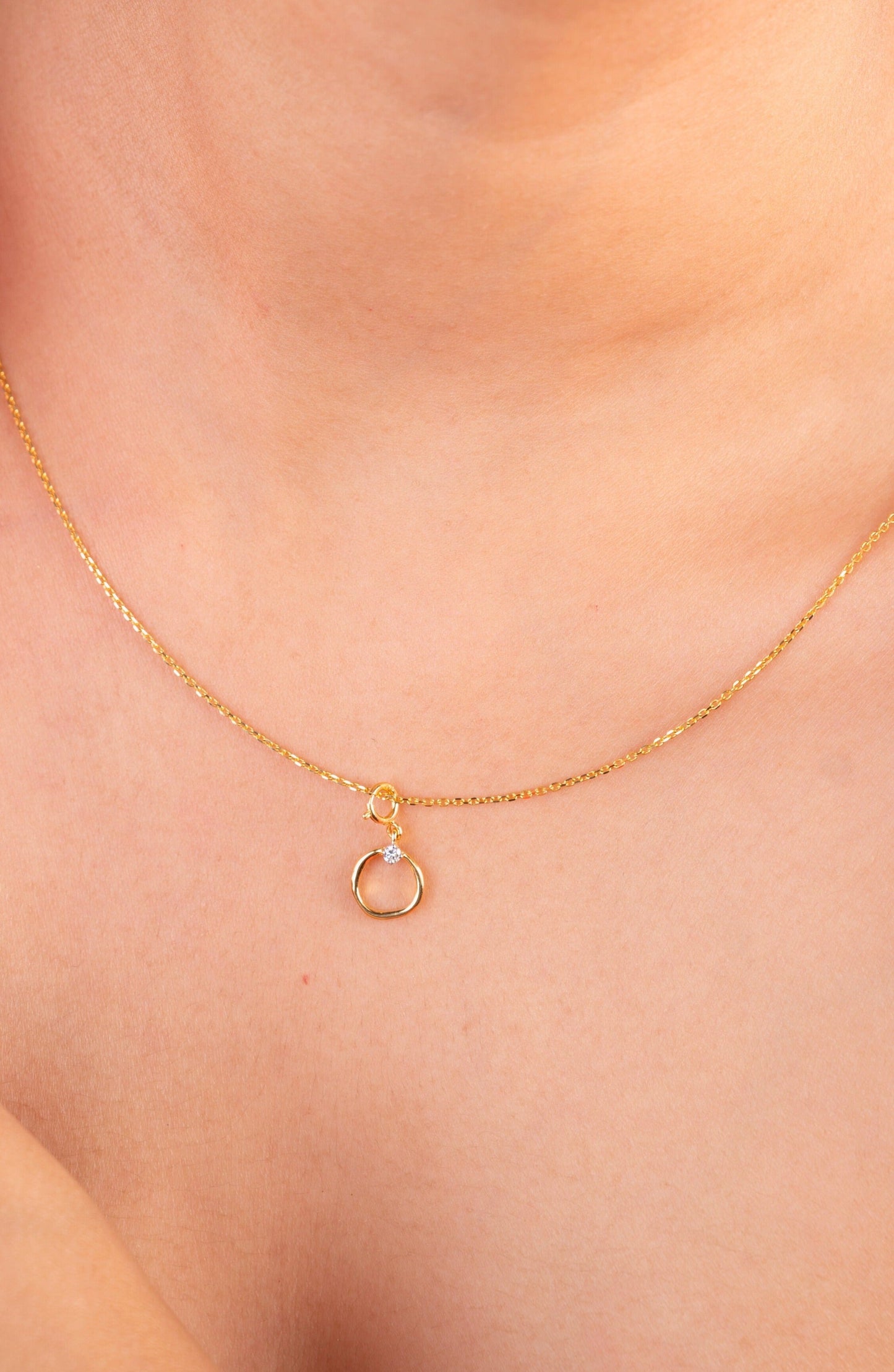 Elevate your style with our playful 18kt gold Curvy Circle Pendant, a delightful addition to any ensemble. Discover timeless beauty with our Spring Diamond Bracelet from the spring edit collection, priced under Rs. 10,000, perfect for everyday wear and thoughtful gifts.