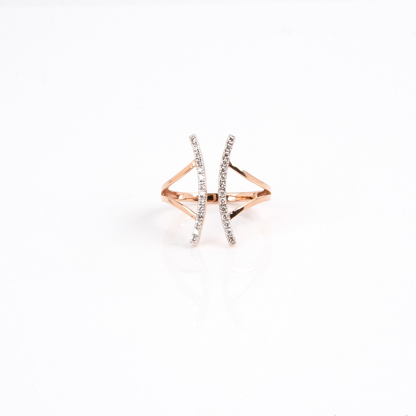Curved Diamond Ring made with 18kt gold. Designed for daily wear, its graceful curvature adds a touch of sophistication to any outfit. Buy it for yourself or a special someone, this versatile piece is the perfect gift idea. Explore our affordable collection under 50,000 for gifting inspiration. Elevate your workwear edit with this timeless accessory that exudes elegance and charm.
