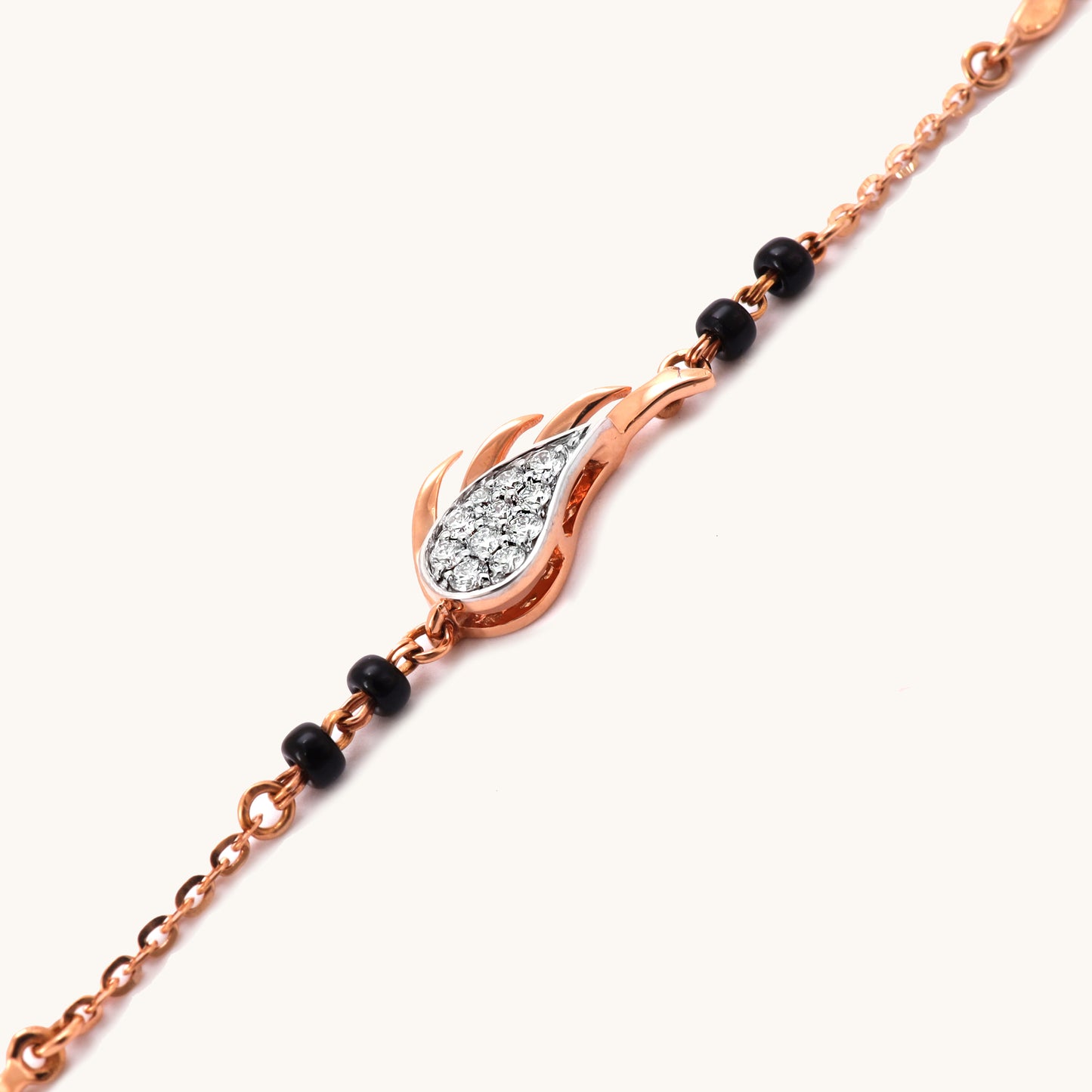 A close up of 18kt gold Diamond Petal Bracelet with IGI-certified VVS diamonds, ideal for everyday wear or special occasions under Rs. 30k.