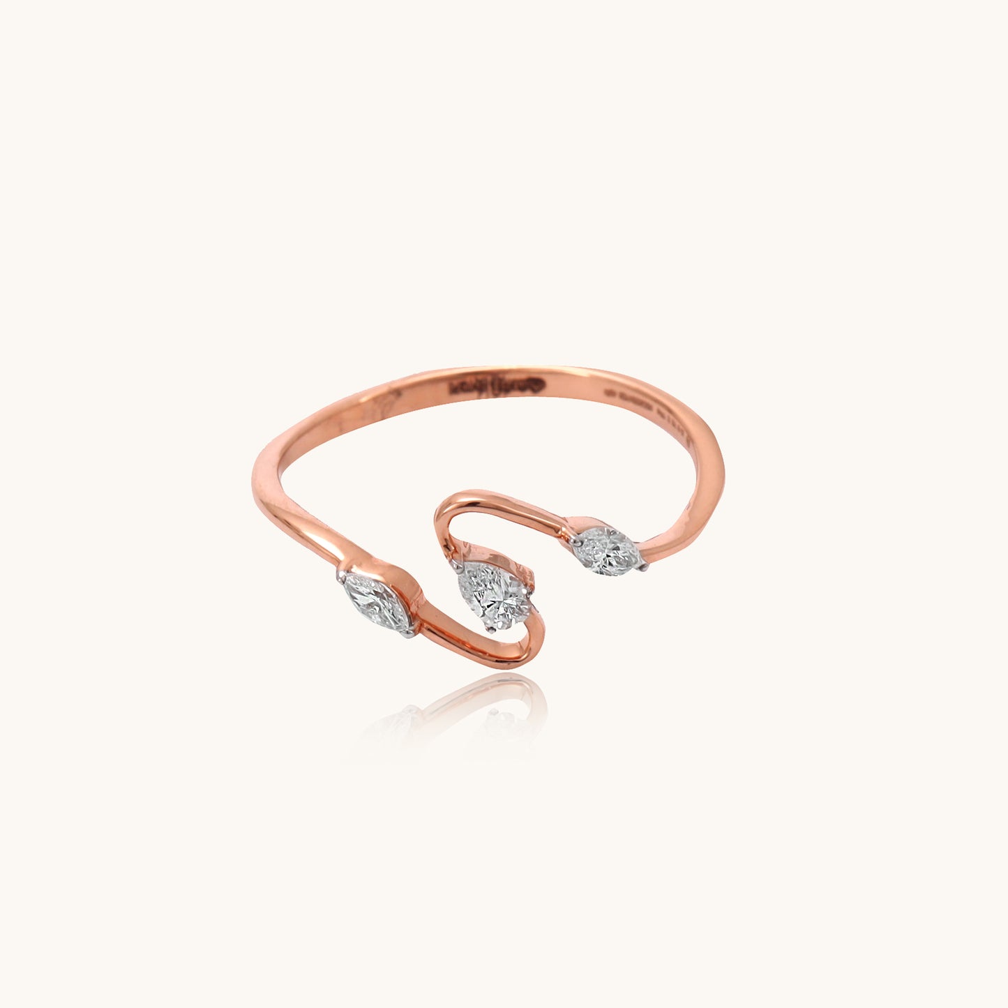 Caratly Diamond Trine Ring in 18kt gold with IGI certified VVS diamonds, perfect for luxury jewelry gifts and everyday wear under Rs. 30k.