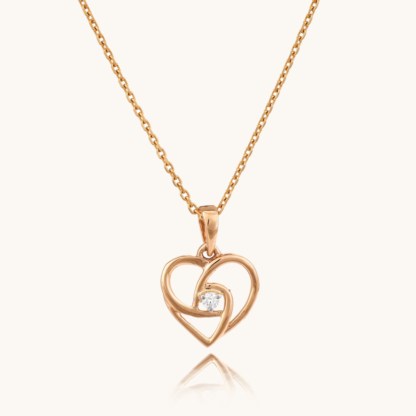Heartbeat Diamond Pendant in 18kt gold featuring IGI-certified VVS diamonds. Affordable, everyday luxury jewelry under ₹15,000 by Caratly.