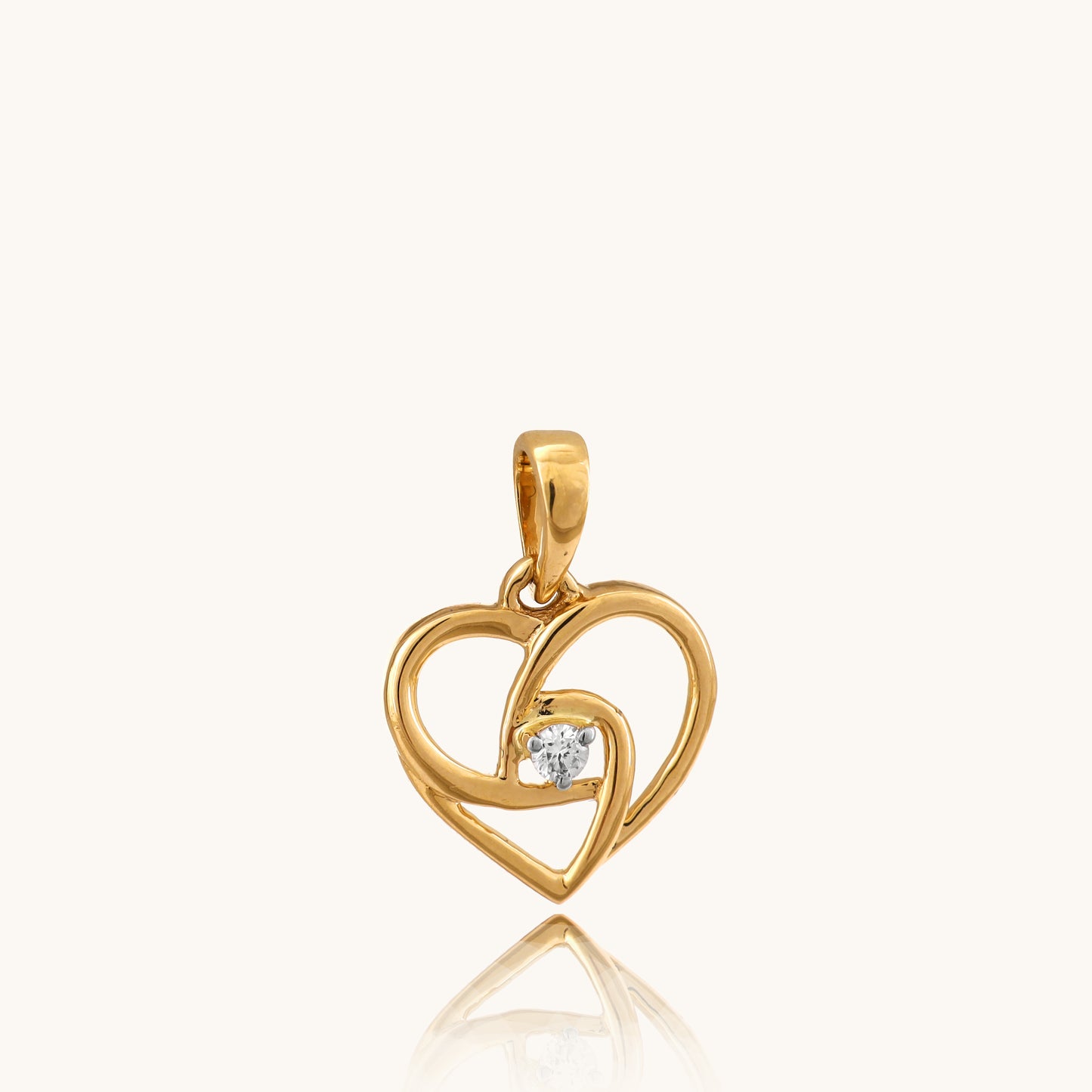 Heartbeat Diamond Pendant in 18kt gold featuring IGI-certified VVS diamonds. Affordable, everyday luxury jewelry under ₹15,000 by Caratly.