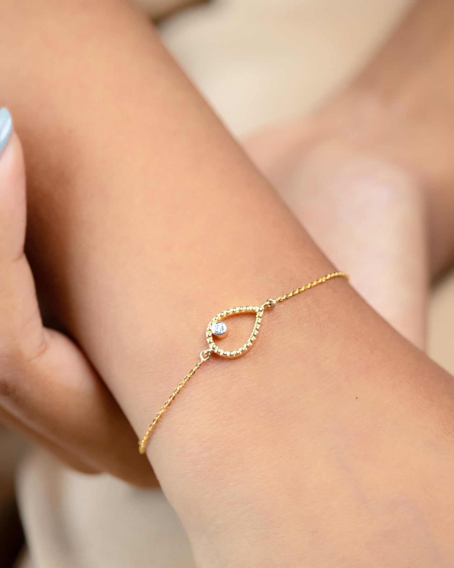 18kt Gold Pear Diamond Bracelet for women under 30,000. Delicate jewellery for everyday elegance. Gift a touch of brilliance to her to elevate her 9 to 5 look effortlessly.