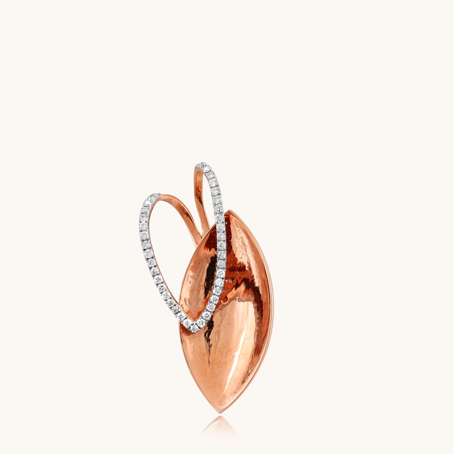 Elevate your style with our exquisite Pear Squash diamond pendant, meticulously crafted in 18kt Gold. This unique piece is designed to make a statement, adding a touch of luxury to your everyday ensemble, enhancing your workwear, or complementing your casual attire. Whether you're gifting it to someone special or treating yourself, this pendant promises to add a hint of everyday sparkle to any look. Explore our Under 50,000 collection now.