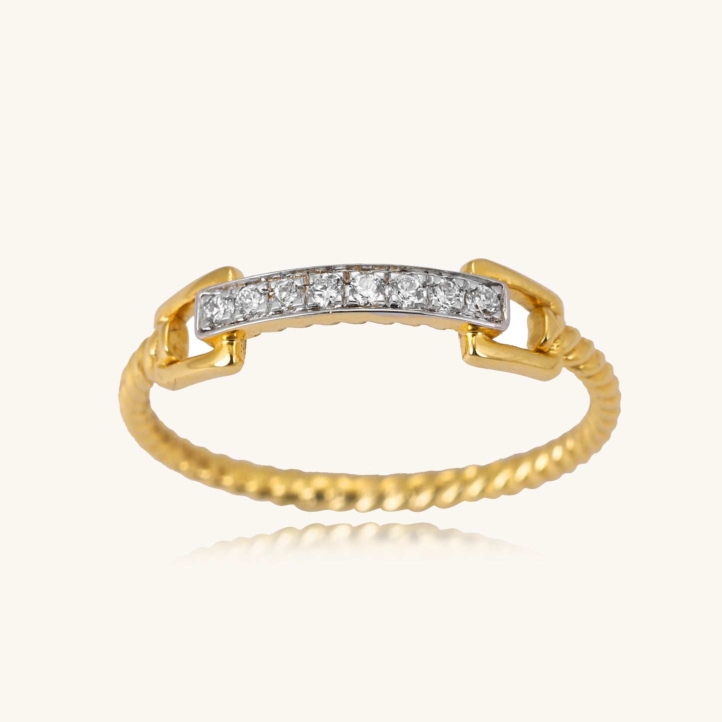 Elevate your style with our 18kt Gold Shimmering Line Ring, a must-have addition to your jewelry collection. Whether you're searching for a thoughtful gift or a versatile everyday wear ring, this design is sure to impress. Priced under 30,000, it's perfect for your casual or workwear edit.