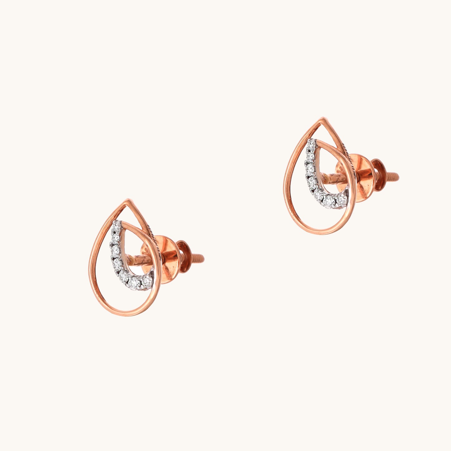 Curvy Diamond Earrings in 18kt gold with IGI-certified VVS diamonds; perfect for everyday wear or gifting under Rs. 20K.
