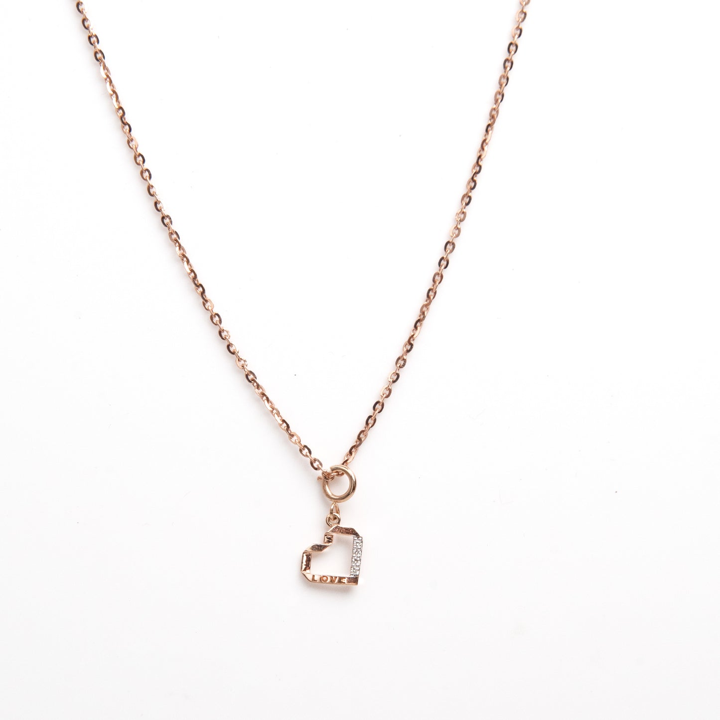 Love heart diamond charm made with 18 kt gold for women, daily wear jewellery, everyday diamond pendant, ideal gift for Valentine's Day, anniversaries from our collection under Rs. 10,000.