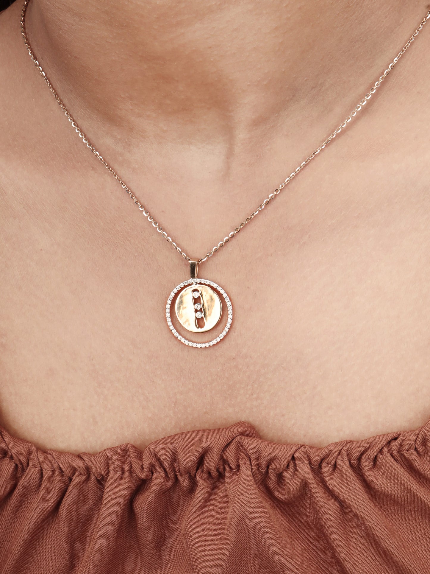 Enhance your style with Double Circle Pendant, crafted in elegant 18kt gold. Its versatile appeal makes it an ideal addition to everyday jewellery collection and a perfect luxurious gifting idea for her.