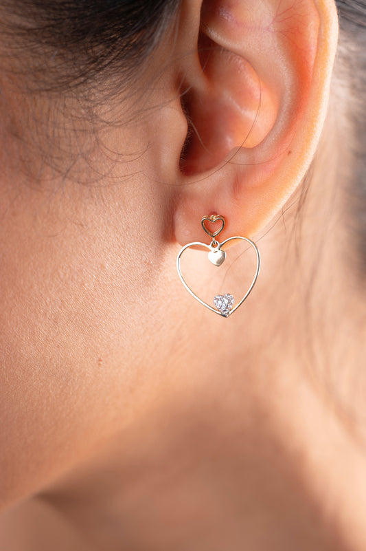 Discover chic sophistication with our Spring Edit, featuring the elegant 18 kt Double Heart Earring, priced under Rs. 50,000. These versatile jewellery pieces effortlessly transition from day to night, making them a perfect addition to any ensemble. Ideal for gifting to her, shop now to add timeless elegance to her collection.