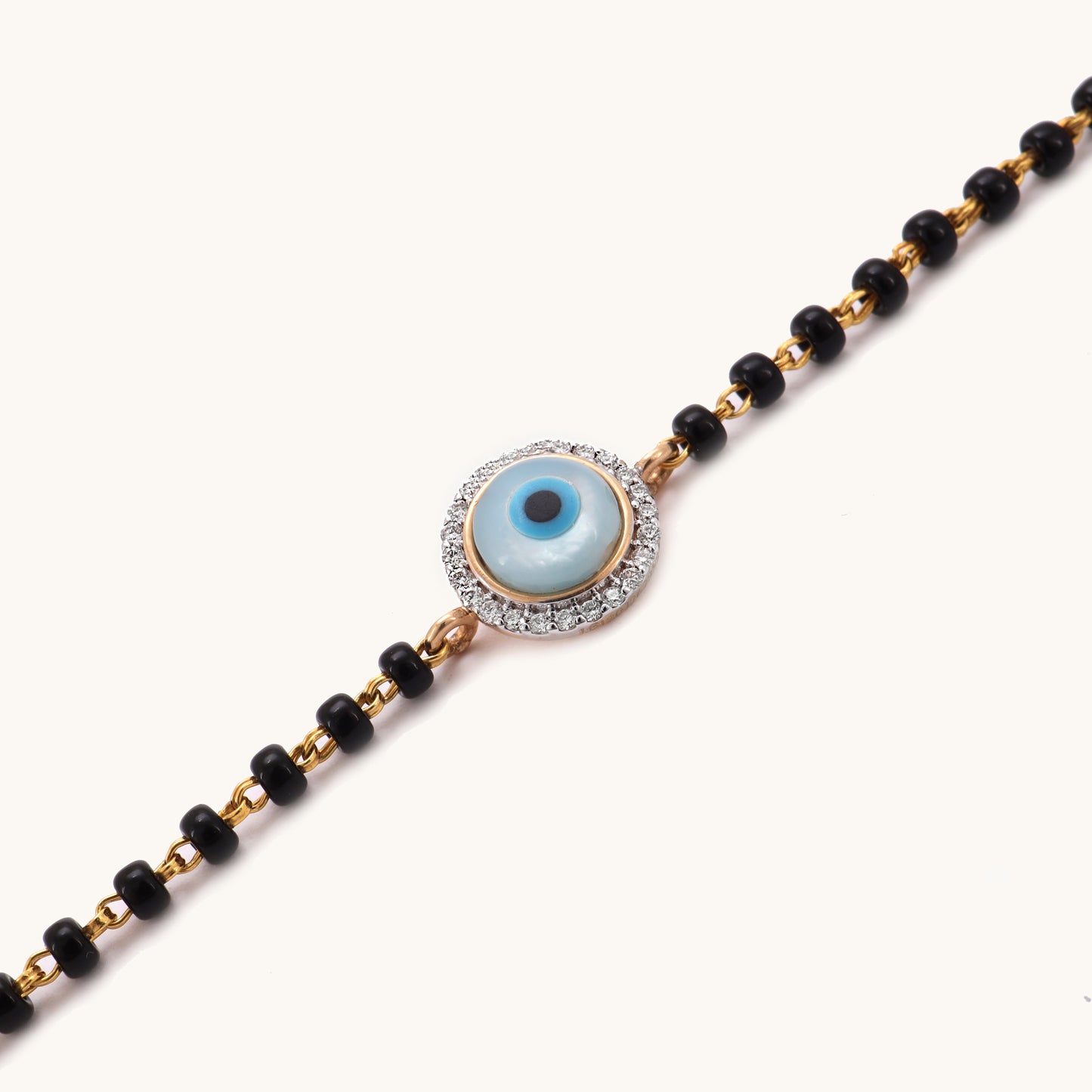 Evil Eye Mangalsutra Bracelet in 18kt BIS hallmarked gold with IGI-certified diamond, ideal for gifting or everyday wear under Rs. 25k.