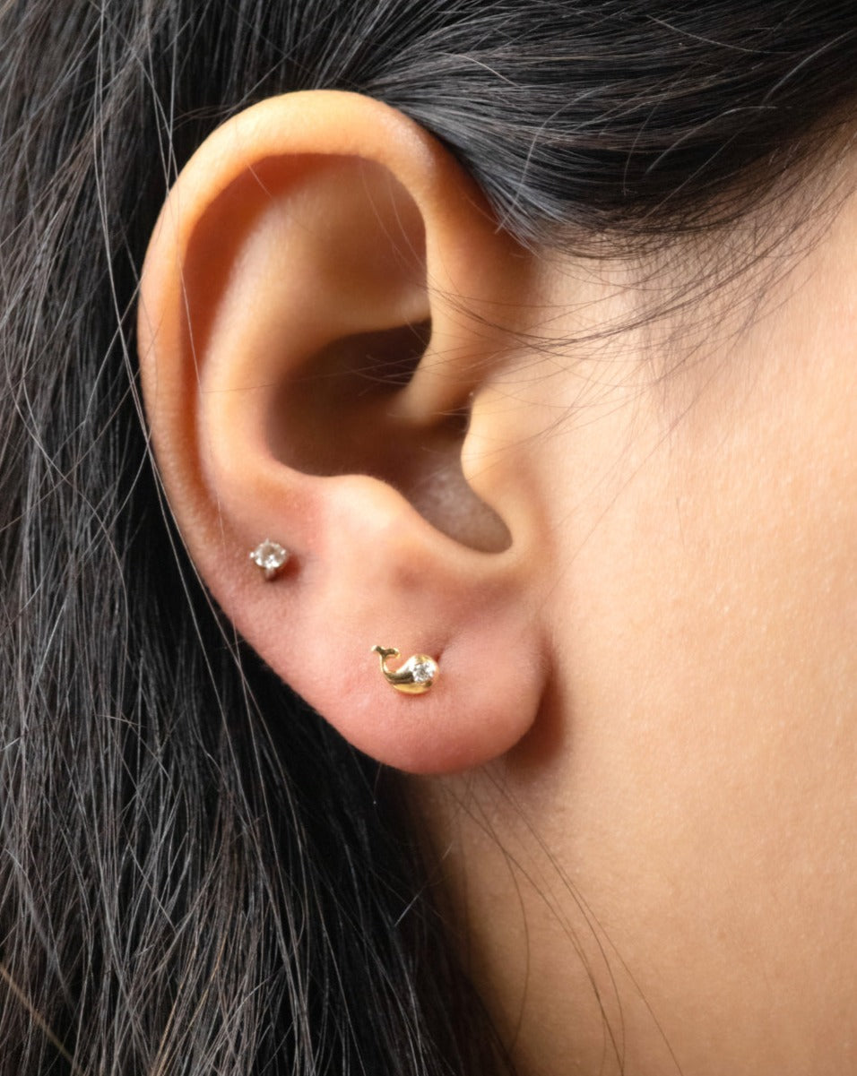 Dive into elegance with our Fish Diamond Earring, crafted in exquisite 18kt gold. Whether it's for yourself or as a thoughtful gift, our Fish Diamond Earring offers a unique symbol of style and grace. Explore our affordable collection under 30,000 for gifting ideas for her.