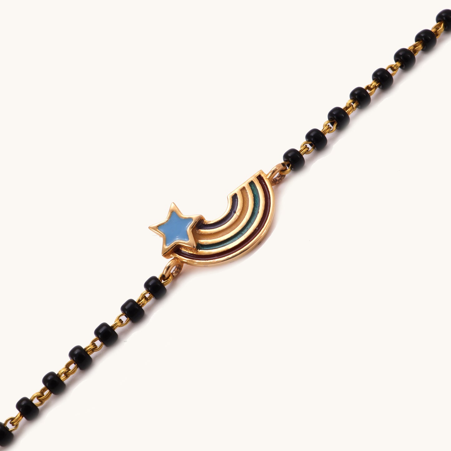Gold Rainbow Nazariya for babies in 18kt gold, featuring IGI-certified VVS diamonds. Ideal for luxury jewelry gifting and everyday wear under Rs. 25k. Shop Caratly Jewelry for high-quality, affordable diamond jewelry.