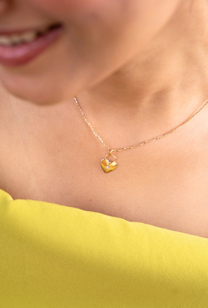 Minimalist Heartlock Diamond Pendant in 18kt gold with real diamonds – a dainty, lightweight pendant for women by Caratly, ideal for everyday wear under 15,000.