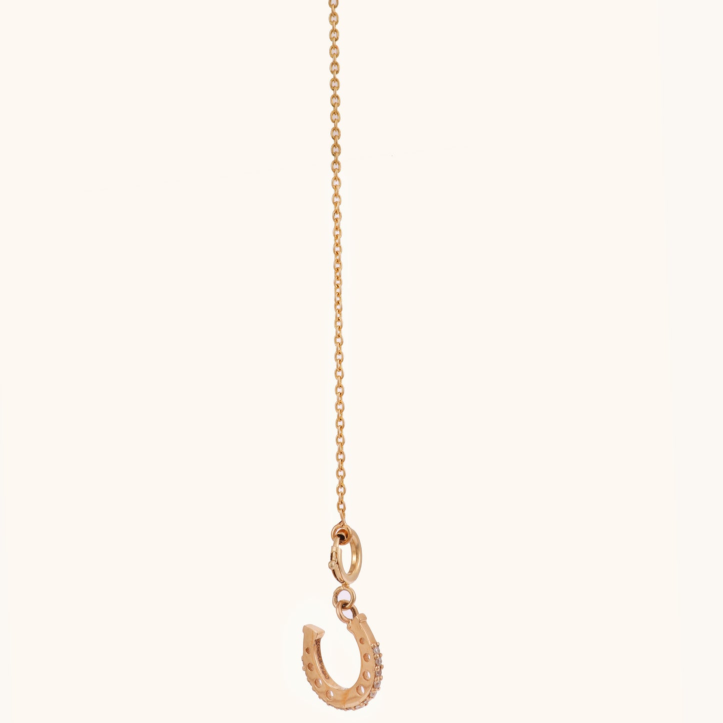 18kt Gold Horseshoe Charm with IGI-certified VVS diamonds, ideal for everyday wear or gifting under an affordable price of Rs. 10k.