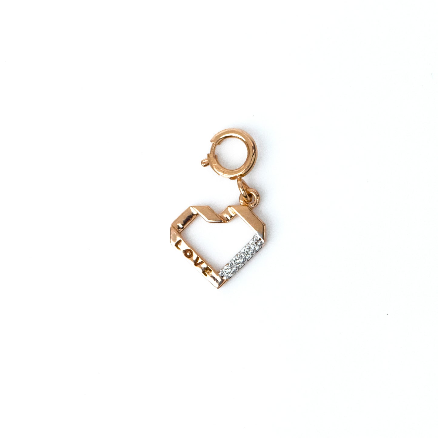 Love heart diamond charm made with 18 kt gold for women, daily wear jewellery, everyday diamond pendant, ideal gift for Valentine's Day, anniversaries from our collection under Rs. 10,000.