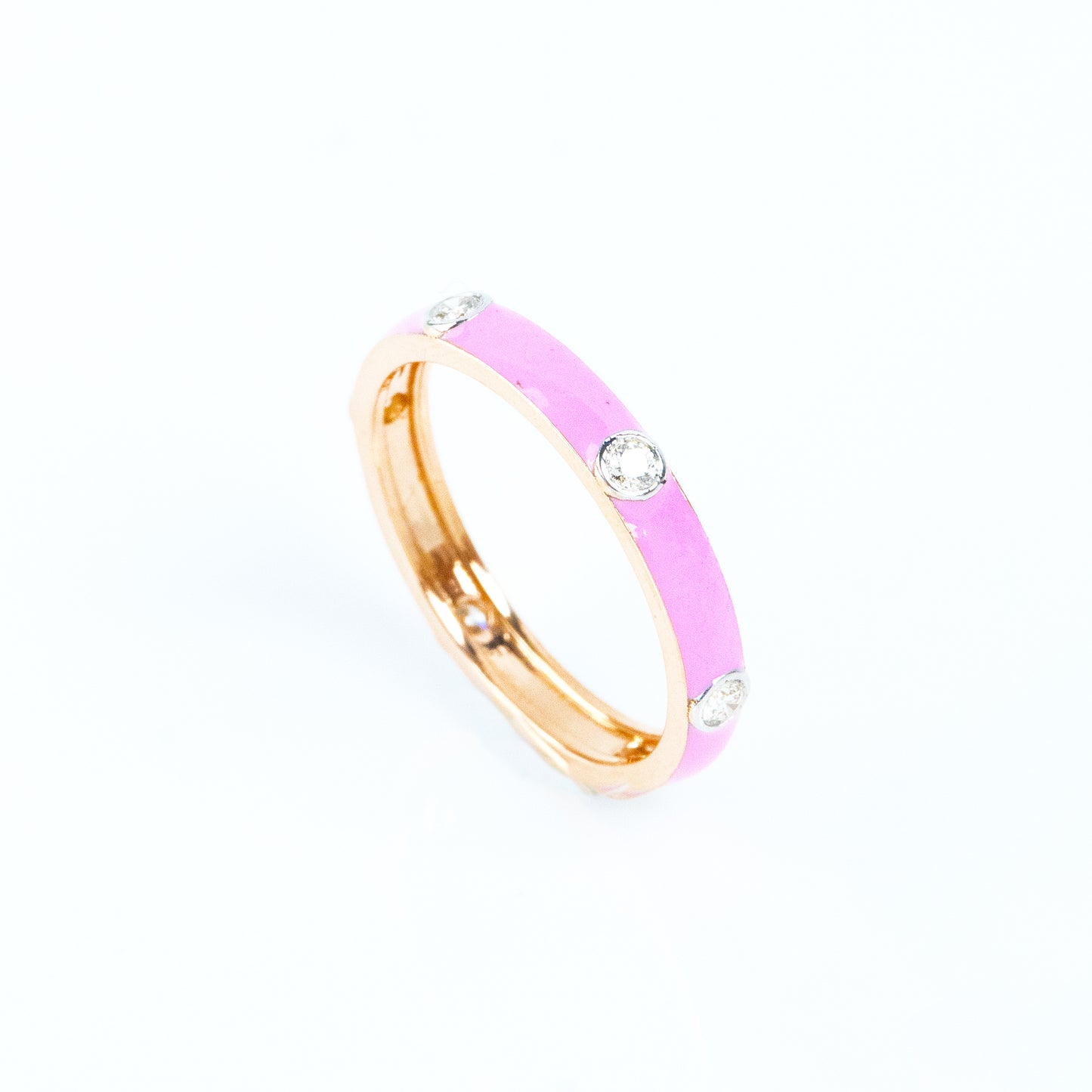 Make a statement with our Pink Band Diamond Ring, crafted in luxurious 18kt Gold. This versatile piece is perfect for daily wear for Women. Buy it as a gift for her or a stylish addition to your own collection. Explore our Under 50,000 jewellery collection for affordable luxury that seamlessly blends style and affordability.