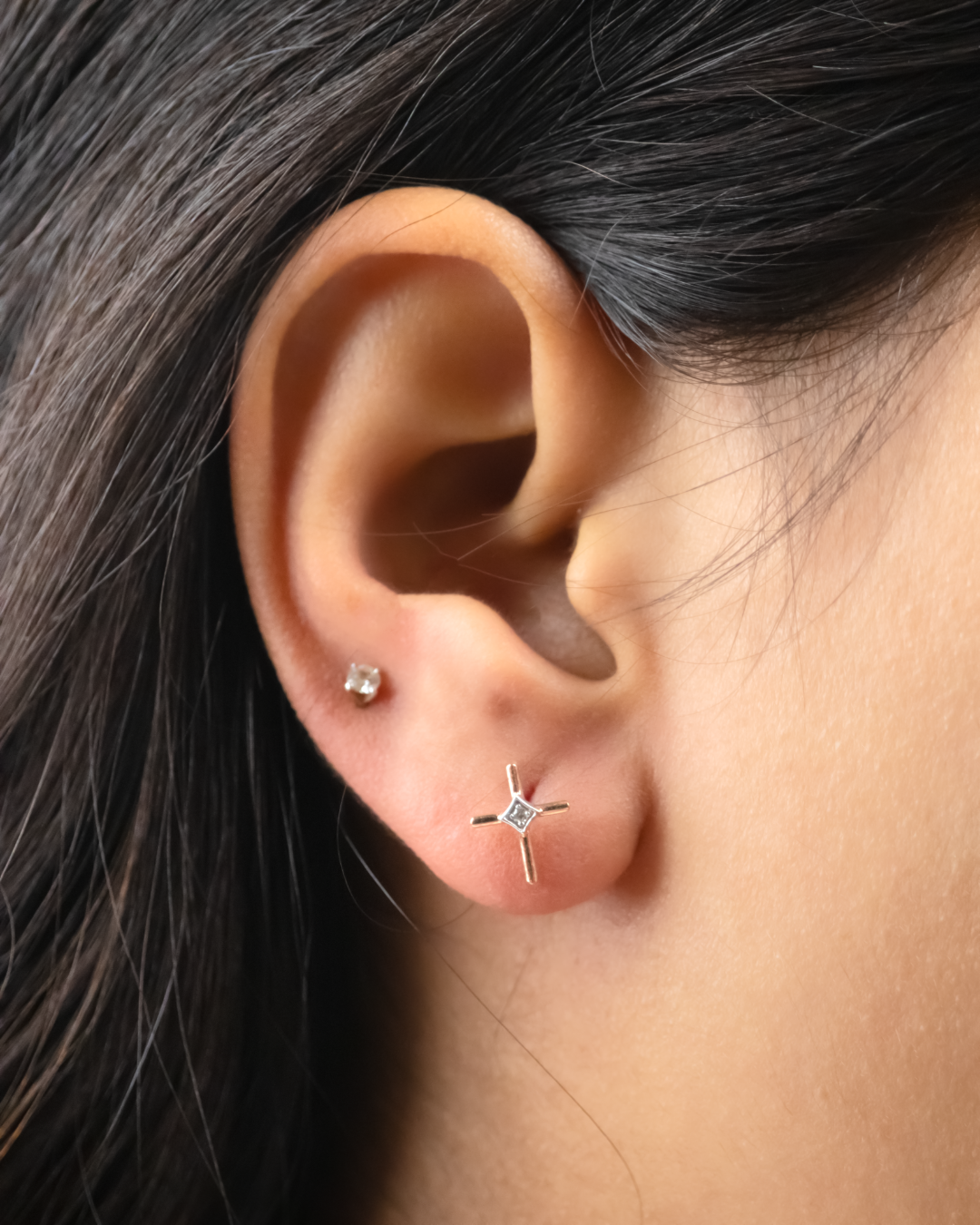 Elevate your everyday look with our Cross Diamond Earring crafted in 18kt gold adding a touch of glamour to any outfit. Versatile and lightweight, it's perfect for daily wear for women and seamlessly transitions from desk to dinner. Whether as a treat for yourself or a thoughtful gift for her, it's an exquisite addition to any jewellery collection all under 30,000.