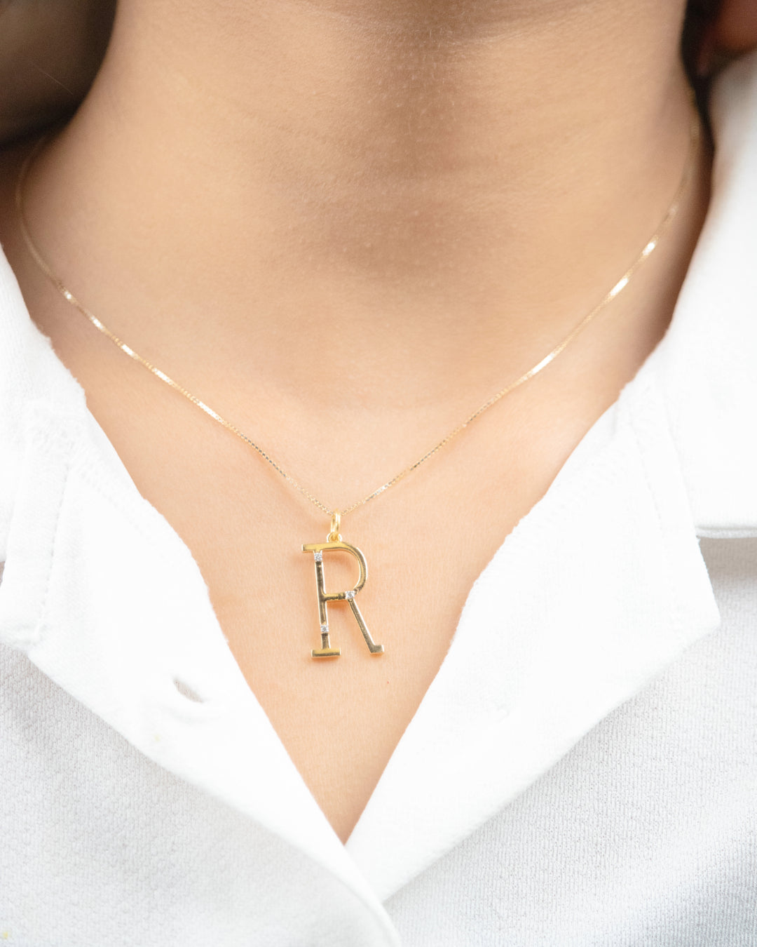 Shine bright from 9 to 5 with our 18 kt Gold Letter Diamond Pendant, a stunning addition to your everyday wear jewellery collection. Perfect for daily wear or as a thoughtful gift for her. Elevate your workwear edit effortlessly with this affordable yet luxurious jewellery piece Under 30,000.
