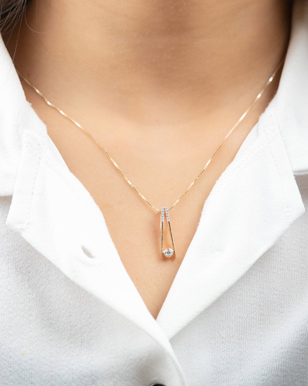 Indulge in timeless elegance with our Elegant Diamond Pendant crafted in luxurious 18kt gold. This pendant is designed for everyday wear for Women. Explore our affordable collection for gifting ideas, ideal for her 9 to 5 wardrobe or as a thoughtful gesture. This pendant offers understated luxury under 30,000 perfect for everyday wear.