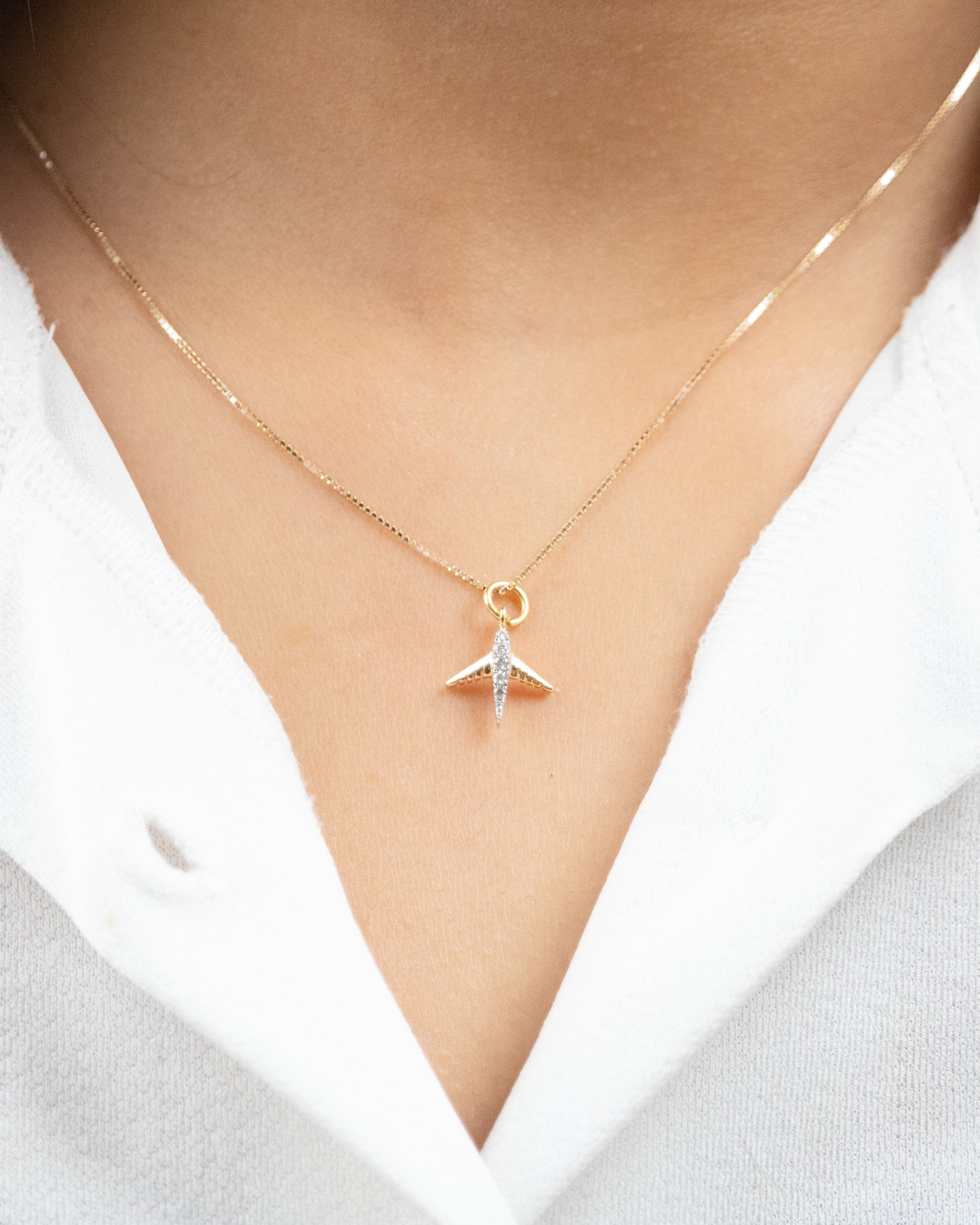 Embark on a journey of style with our stunning 18kt Gold Traveller Diamond Charm. This exquisite piece is designed for daily wear for women. Whether it's for your 9 to 5 wardrobe or as a thoughtful gift for her, explore our affordable collection under 30,000. Shop now and adorn yourself with understated luxury.