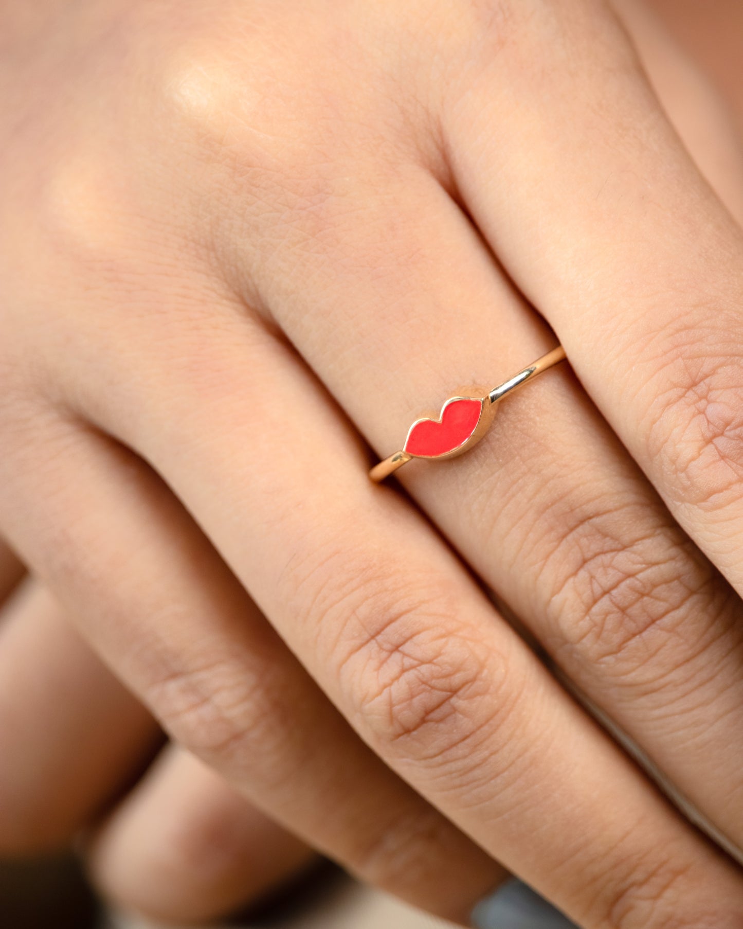 Elevate your style with our chic 18kt Gold Lip Funky Ring. It's adorned with subtle diamonds, making it perfect for daily wear and seamlessly blending into your 9 to 5 wardrobe. Perfect gift idea for her. Explore our under 30,000 collections for more gifting inspiration and discover the perfect piece to express your unique style.