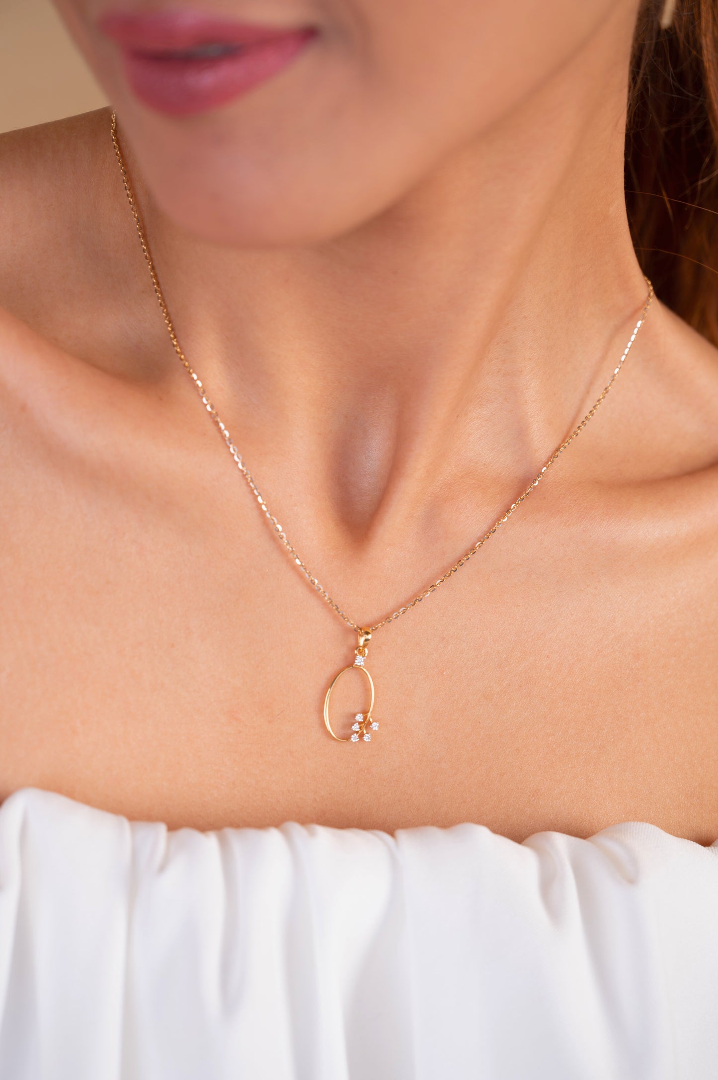 Elevate your style with our exquisite 18kt Gold Pendant Necklace. Crafted with exceptional attention to detail, this necklace is a thoughtful and versatile gift idea. Explore our under 30,000 collection and discover the perfect accessory to complement your everyday wear, from the office to weekend outings.