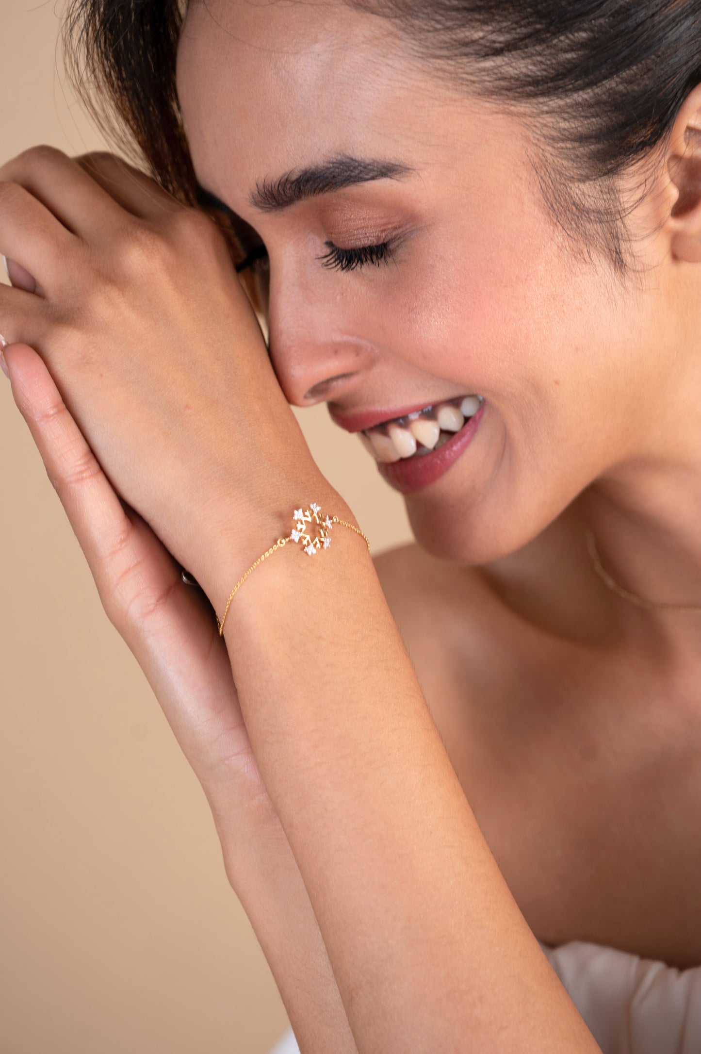 Elevate your everyday look with the 18kt Snowflake Diamond Bracelet. This versatile bracelet is perfect for work, casual occasions, and gifting. Achieve a polished, understated elegance with this Under Rs. 30,000 piece from our everyday wear collection. Pair it with your favorite outfits to add a touch of effortless luxury and sophistication to your style.