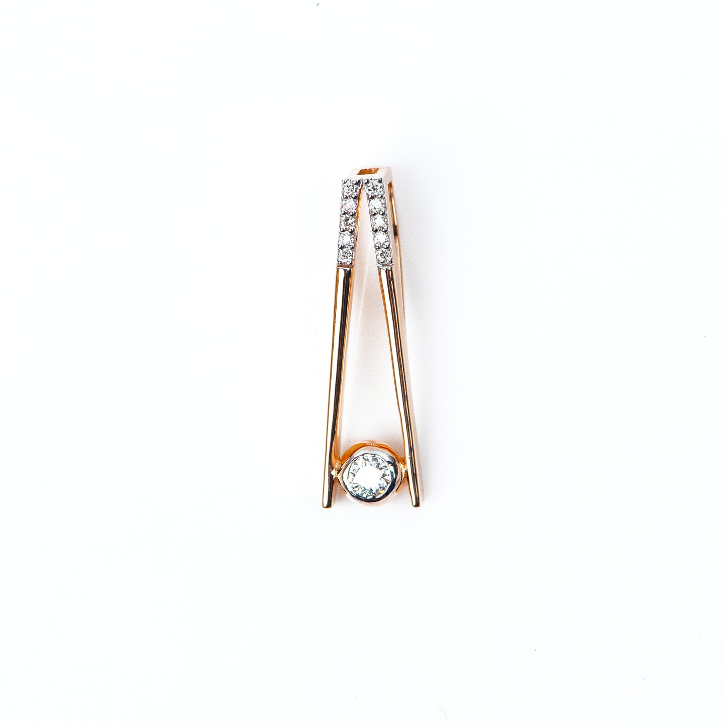 Caratly 18kt gold Elegant Diamond Pendant with 0.10ct solitaire diamond in a modern V-shape drop setting. Minimalist gift ideas for her under 40,000