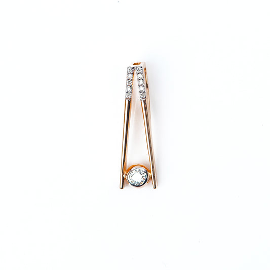 Caratly 18kt gold Elegant Diamond Pendant with 0.10ct solitaire diamond in a modern V-shape drop setting. Minimalist gift ideas for her under 40,000