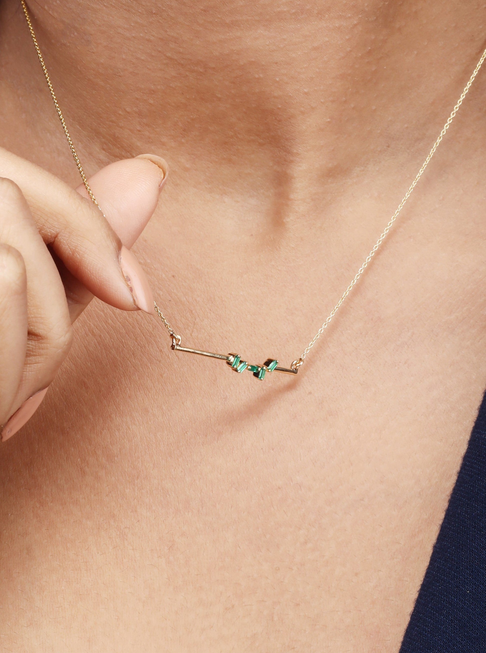 18kt Gold Baguette Emerald Necklace Under Rs. 30,000. An Elegant Touch for Everyday Wear for Women, A Classic Gemstone Beauty For Luxurious Gifting for her.