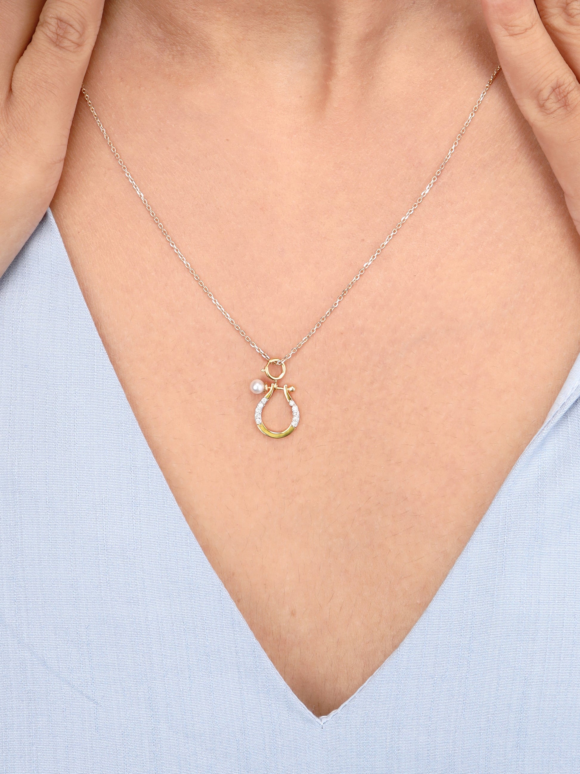 Elevate your everyday style with our Horse Shoe Pendant, finely crafted in 18kt gold and diamond. Jewellery gifting ideas to wish good fortune on birthdays or graduations. Explore our affordable gifting option under Rs. 10,000.