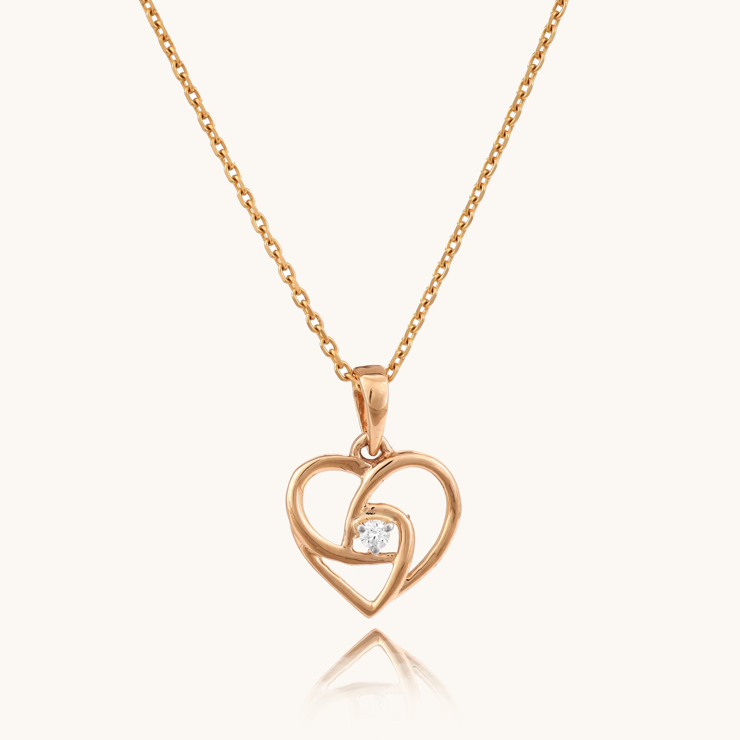 Embrace the rhythm of love with our meaningful 18kt gold Heartbeat Diamond Pendant. This delicate design captures the essence of love in a sparkling diamond, perfect for everyday wear, adding a touch of sentiment to your casual looks, workwear, or special occasions. Priced under 30,000, it's the ideal gift for her, symbolizing your affection in an elegant and timeless piece. 