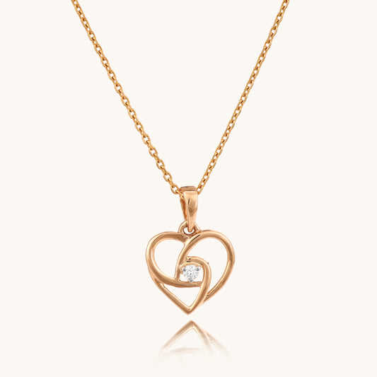 Embrace the rhythm of love with our meaningful 18kt gold Heartbeat Diamond Pendant. This delicate design captures the essence of love in a sparkling diamond, perfect for everyday wear, adding a touch of sentiment to your casual looks, workwear, or special occasions. Priced under 30,000, it's the ideal gift for her, symbolizing your affection in an elegant and timeless piece. 