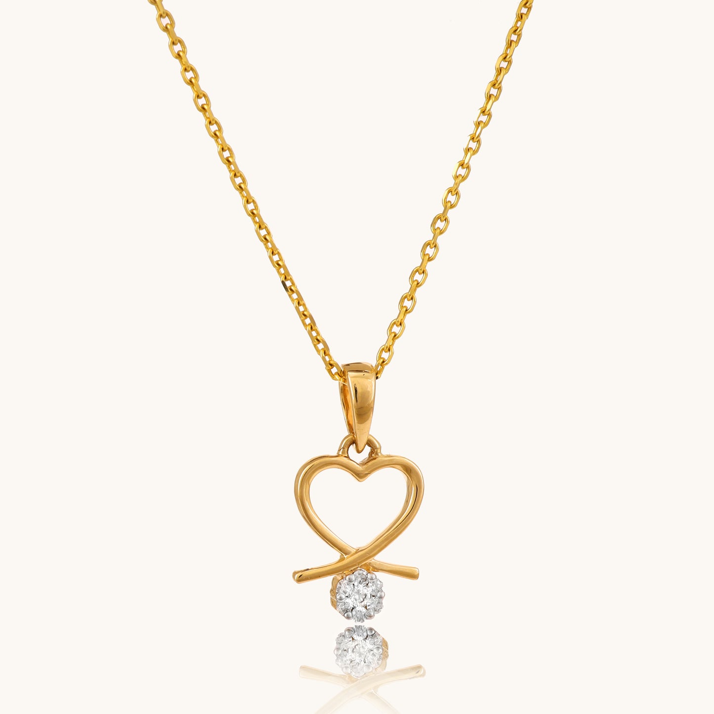 Love Heart Locket in 18kt gold and diamond. Shop trendy gold and diamond jewellery online under Rs 20,000. Latest 2024 collection of minimal designs. Best prices in India for stylish jewellery. Gifts in gold for loved ones. Gold and diamond jewellery online, Latest collection, Best prices in India, Trendy jewellery.