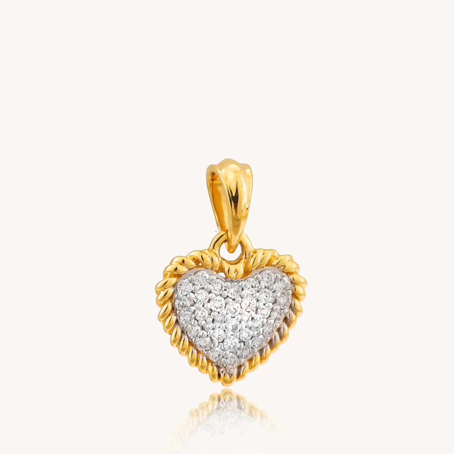 Cluster Heart Pendant in 18kt gold and diamond. Shop Caratly's latest 2024 collection of gold and diamond jewellery online under Rs 30,000. Trendy and stylish 18kt gold pieces at best prices in India. Minimal designs, affordable prices. Gold and diamond jewellery online, Latest collection, Best prices in India, Trendy jewellery, Gifts in gold