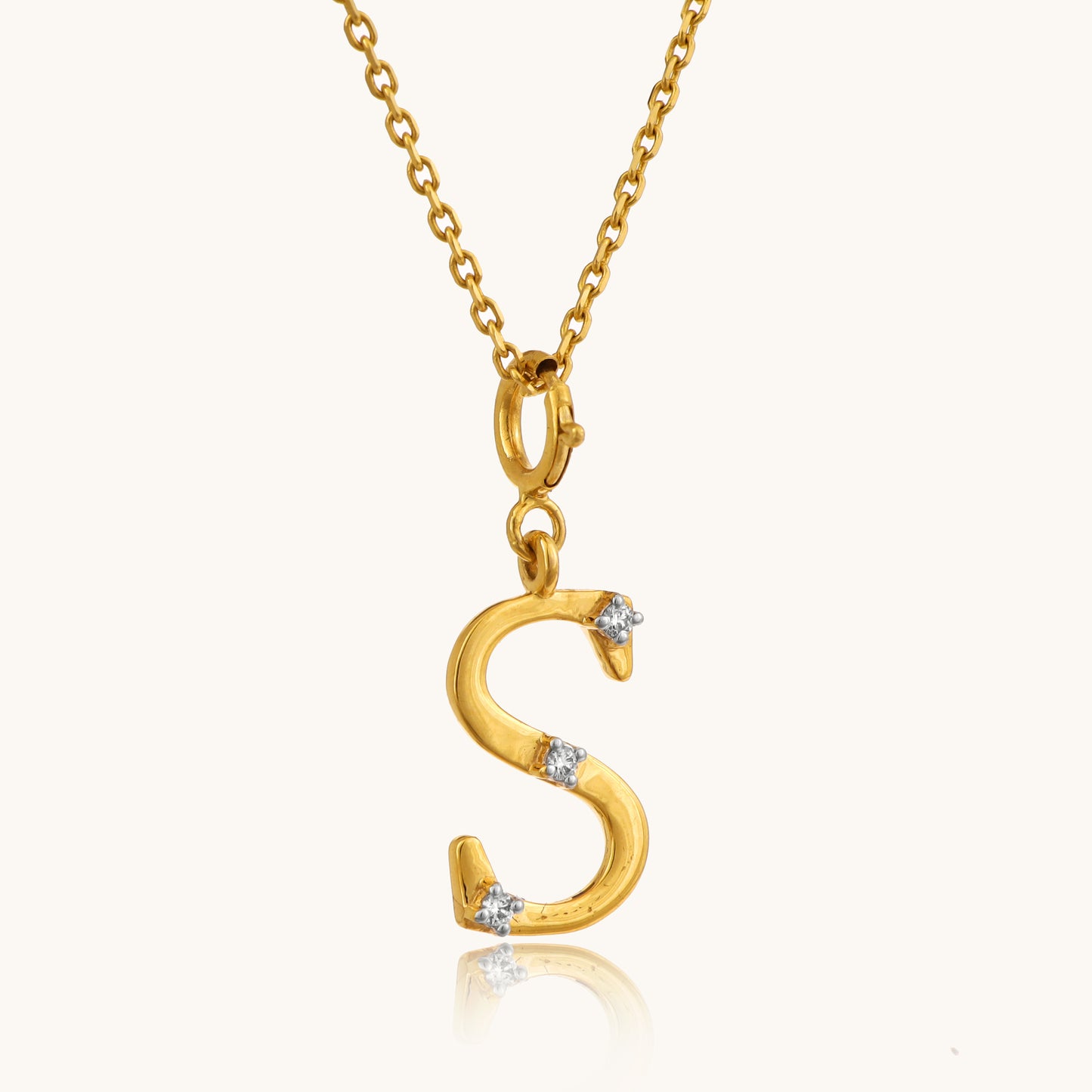 Discover timeless elegance with our 18 kt S Diamond Pendant from the Spring Edit collection, priced under 10,000. This exquisite jewelry piece is crafted to perfection, radiating sophistication and grace. Whether for a special occasion or everyday wear, it serves as a meaningful symbol of love and appreciation.