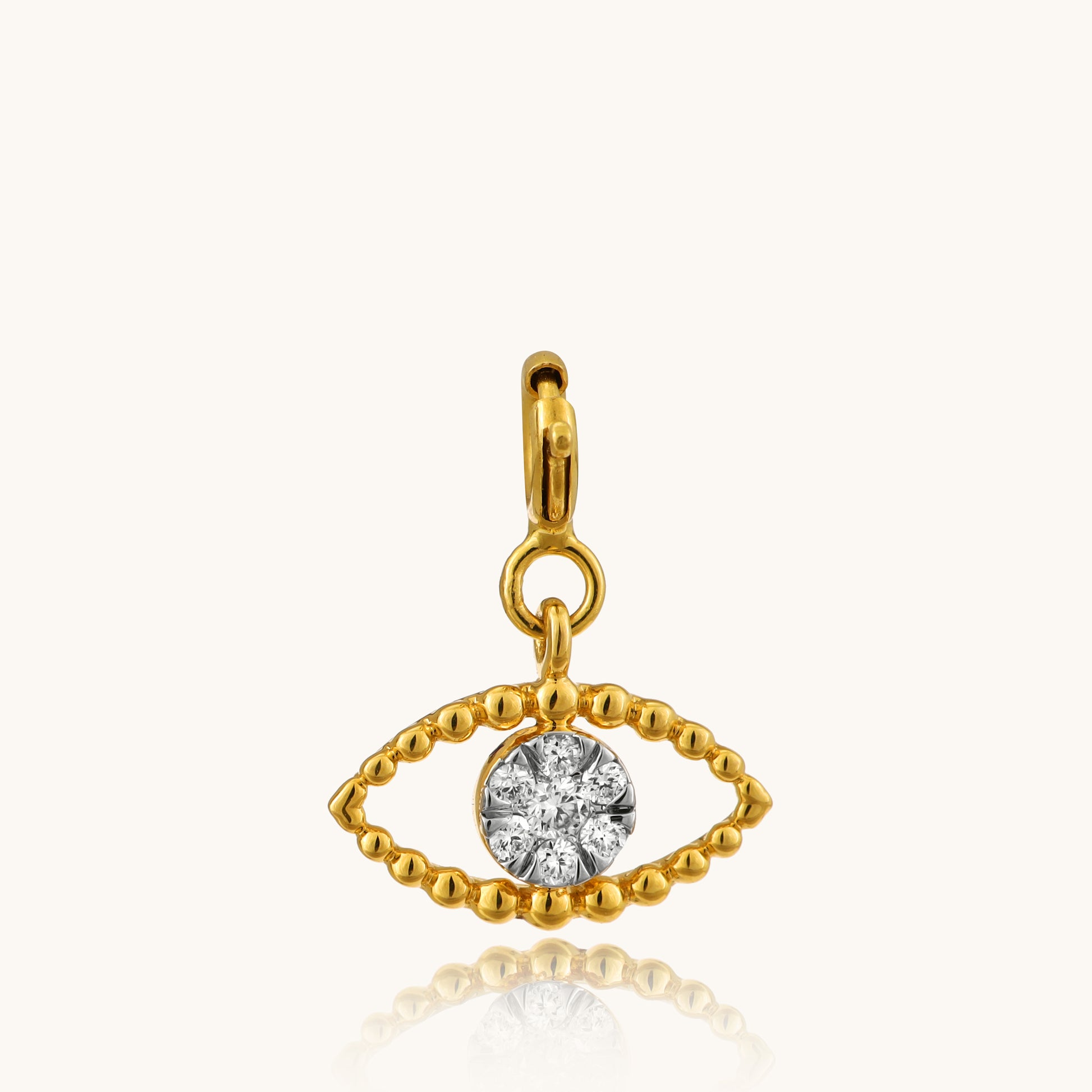 Unleash your inner power with our captivating 18kt gold Diamond Eye Pendant. Discover timeless beauty with our Spring Diamond Bracelet, priced under Rs. 30,000, perfect for everyday wear and thoughtful gifts. This intriguing design adds a touch of everyday enchantment to your casual looks, workwear, or evening attire.