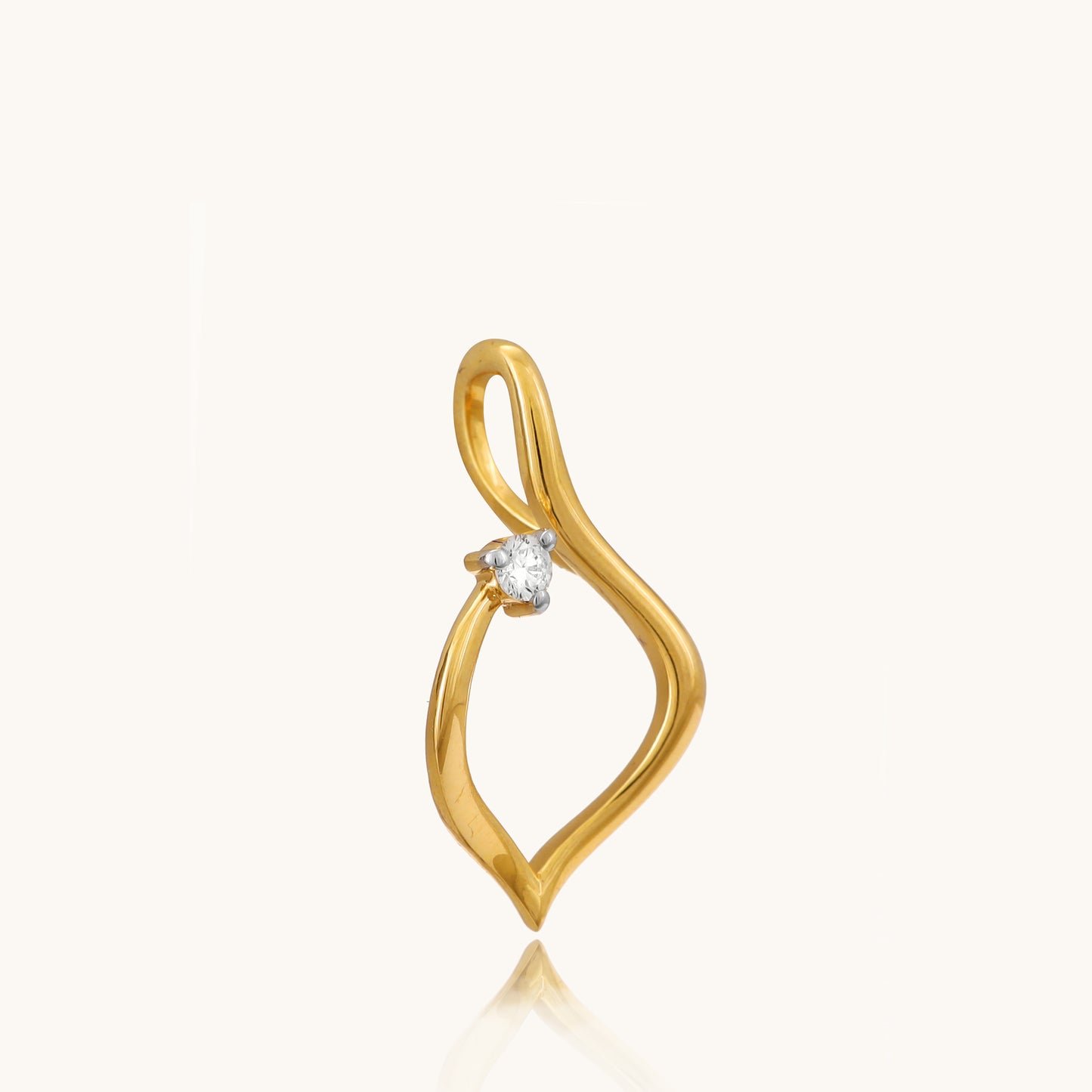 Elevate your everyday look with our delicate Twirly Diamond Pendant, crafted in 18kt gold. This playful design dances with every move, adding a touch of whimsy and sparkle to your attire, whether it's your workwear edit or casual ensemble. A perfect gift for her priced under 30,000, this pendant is both charming and versatile.