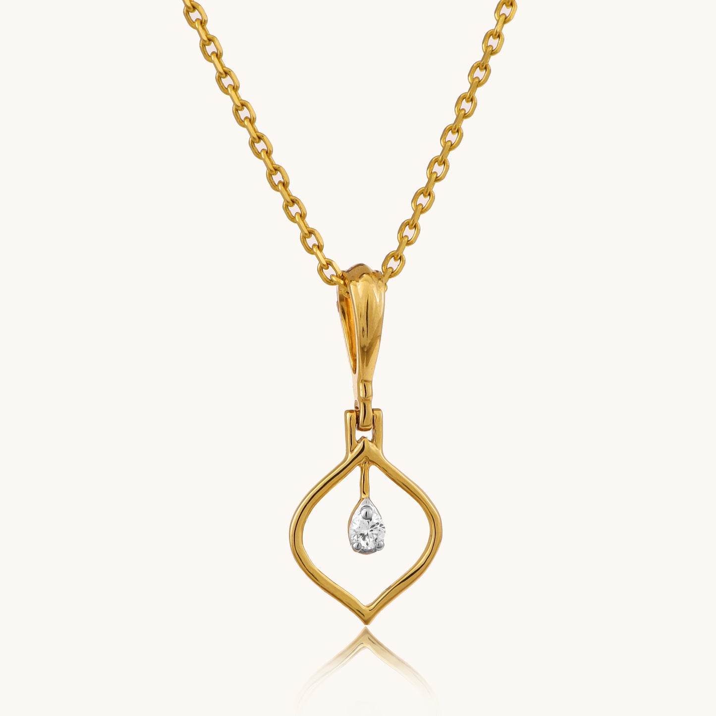 Enhance your everyday style with our charming 18kt gold Droplet Diamond Pendant. Discover timeless beauty with our Spring Diamond Bracelet, an exquisite piece priced under Rs. 10,000, perfect for everyday wear and thoughtful gifts. This minimalist pendant adds a delicate sparkle to any ensemble, whether it's casual wear, workwear, or special occasions. 