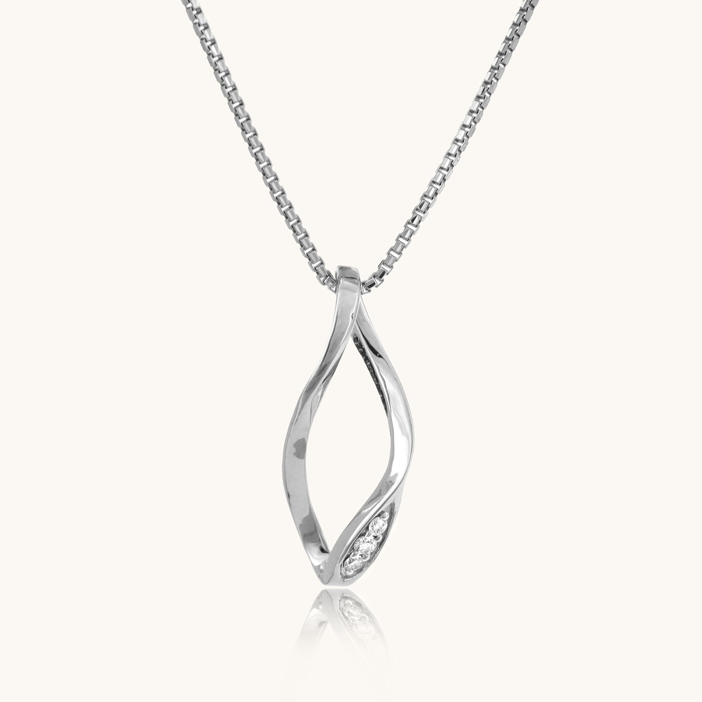 Unveil the enchantment of our 18 kt Tilting Diamond Pendant, priced under Rs. 30,000. A seamless blend of elegance and affordability, this exquisite piece is tailored for everyday wear, elevating your 9 to 5 ensemble with timeless sophistication. Whether as a personal indulgence or a thoughtful gift for her, its allure epitomizes grace and style.