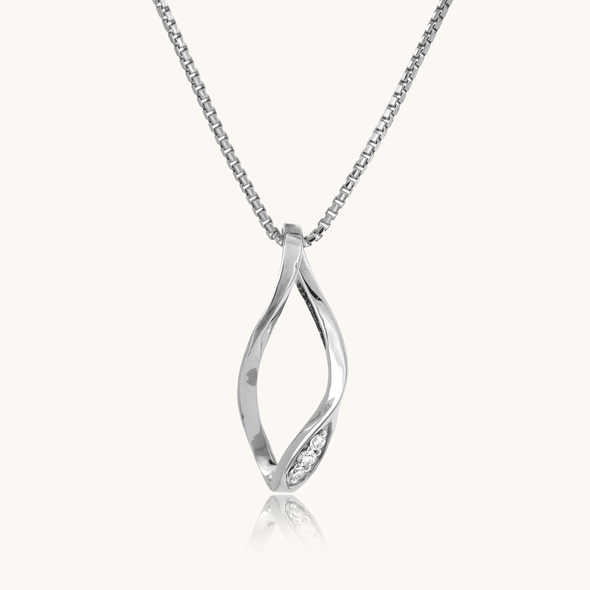 Unveil the enchantment of our 18 kt Tilting Diamond Pendant, priced under Rs. 30,000. A seamless blend of elegance and affordability, this exquisite piece is tailored for everyday wear, elevating your 9 to 5 ensemble with timeless sophistication. Whether as a personal indulgence or a thoughtful gift for her, its allure epitomizes grace and style.