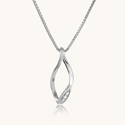 Unveil the enchantment of our 18 kt Tilting Diamond Pendant, priced under Rs. 30,000. A seamless blend of elegance and affordability, this exquisite piece is tailored for everyday wear, elevating your 9 to 5 ensemble with timeless sophistication. Whether as a personal indulgence or a thoughtful gift for her, its allure epitomizes grace and style.